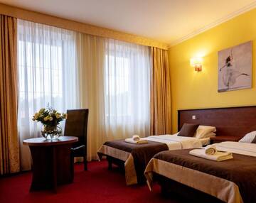 Фото номера Двухместный номер с 2 отдельными кроватями Отель Hotel Piotr Spa&amp;Wellness г. Богушув-Горце 2